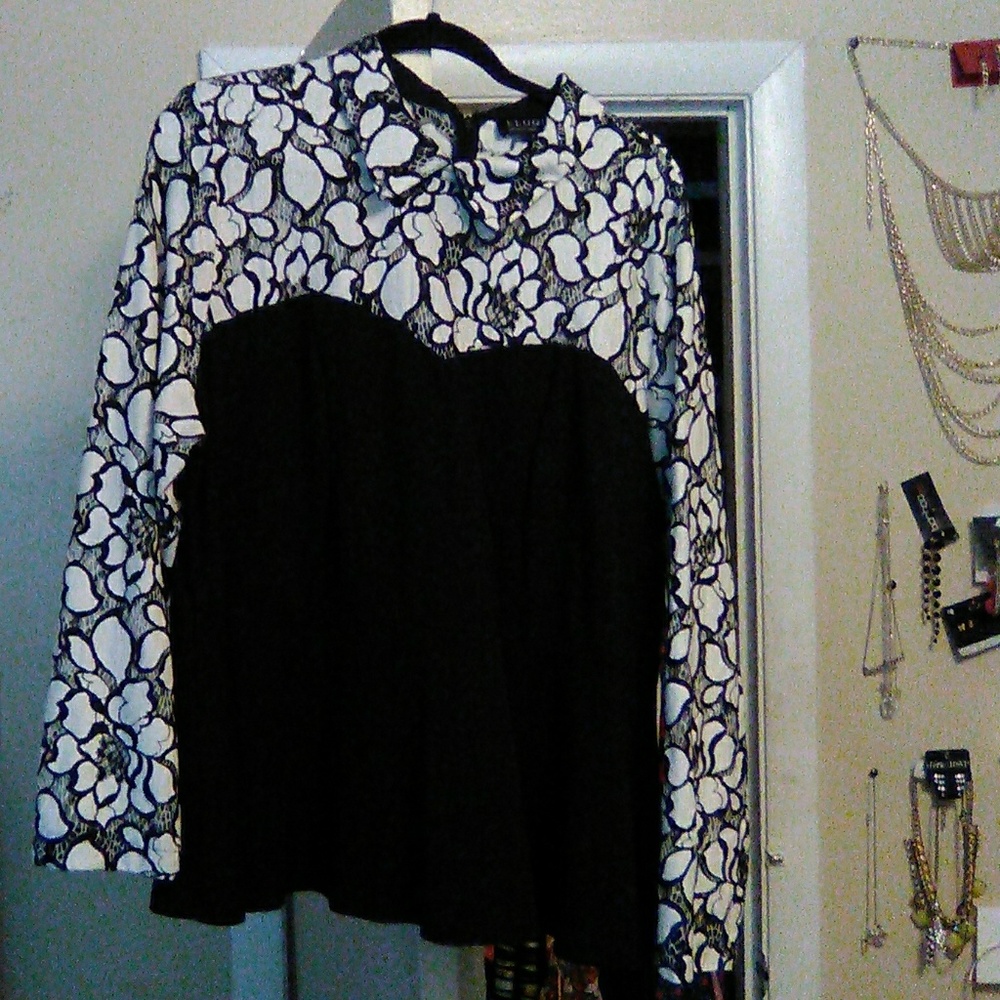 Lace peplum shirt.